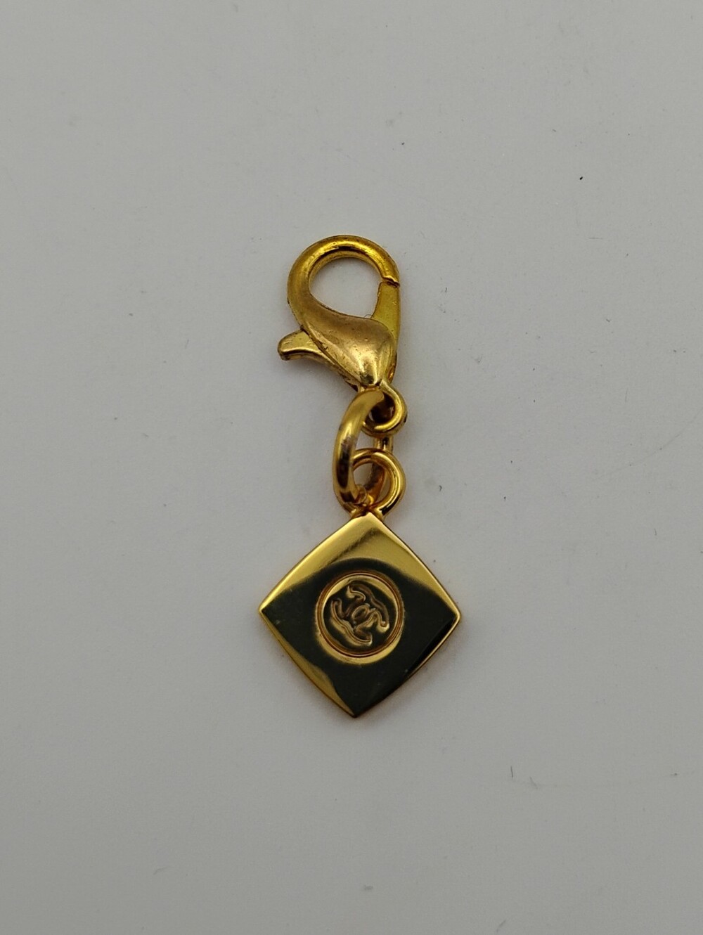 CHANEL Gold and Black Square Charm with CC Logo - Picture 2 of 4